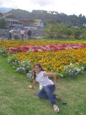 Woman posing by the famous flowers of Boquete – Best Places In The World To Retire – International Living